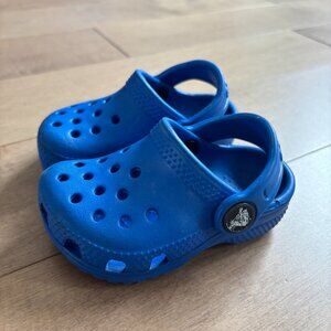 Bright blue infant/toddler Crocs size 4